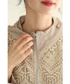A light jacket with a hood made of beautiful cutwork lace