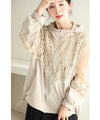 A light jacket with a hood made of beautiful cutwork lace