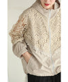 A light jacket with a hood made of beautiful cutwork lace