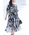 A sheer floral mid-length dress with pleats that flares out from the neck