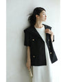 Traditional jacket with gold buttons and a sailor collar and shoulder pads