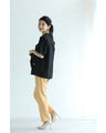 Traditional jacket with gold buttons and a sailor collar and shoulder pads