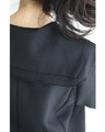 Traditional jacket with gold buttons and a sailor collar and shoulder pads
