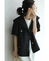 Traditional jacket with gold buttons and a sailor collar and shoulder pads