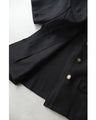 Traditional jacket with gold buttons and a sailor collar and shoulder pads