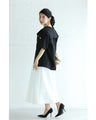 Traditional jacket with gold buttons and a sailor collar and shoulder pads