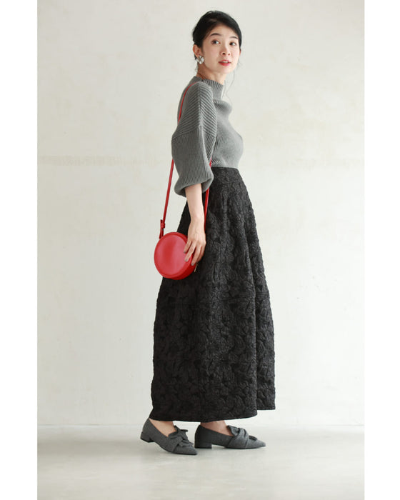 ツイストリボンのローヒールパンプス