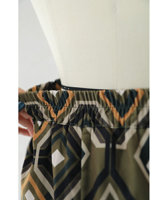 繋がりあう幾何学アートのミディアムスカート