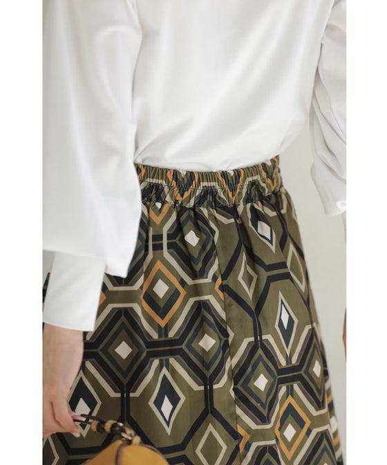 繋がりあう幾何学アートのミディアムスカート