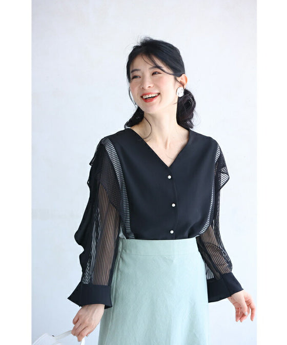 Two-tone blouse top with flowing ruffles and sheer striped sleeves