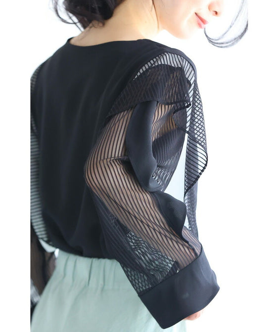 Two-tone blouse top with flowing ruffles and sheer striped sleeves