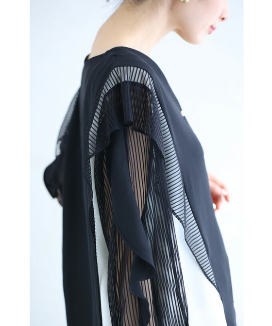 Two-tone blouse top with flowing ruffles and sheer striped sleeves