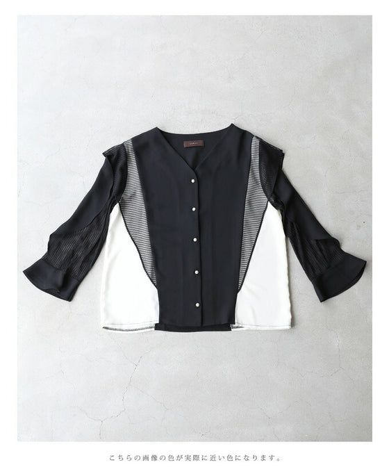 Two-tone blouse top with flowing ruffles and sheer striped sleeves