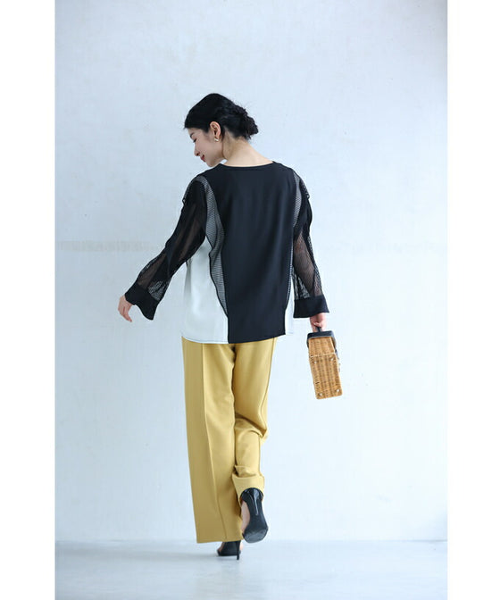 Two-tone blouse top with flowing ruffles and sheer striped sleeves