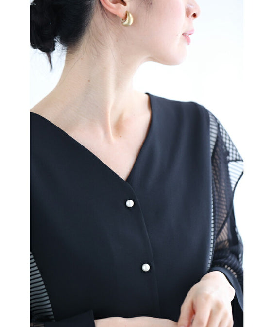 Two-tone blouse top with flowing ruffles and sheer striped sleeves