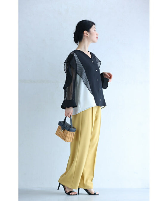 Two-tone blouse top with flowing ruffles and sheer striped sleeves