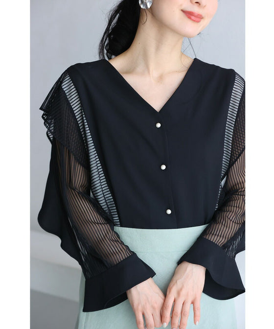 Two-tone blouse top with flowing ruffles and sheer striped sleeves