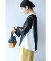 Two-tone blouse top with flowing ruffles and sheer striped sleeves