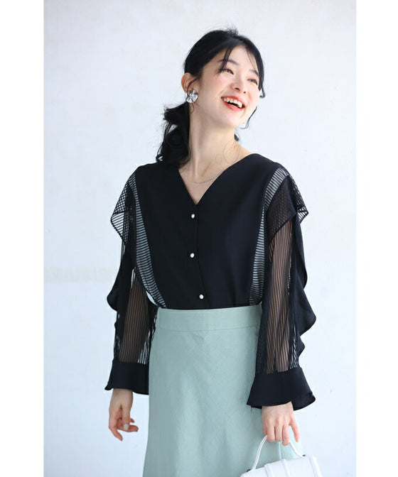 Two-tone blouse top with flowing ruffles and sheer striped sleeves