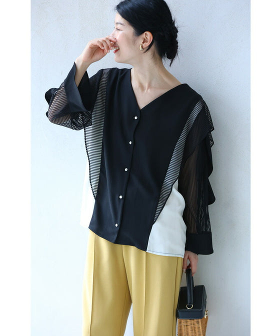 Two-tone blouse top with flowing ruffles and sheer striped sleeves