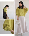 Elegantly sparkling shiny needleman cut-and-sew top