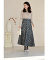 エキゾチックな花柄のデニム調ロングスカート