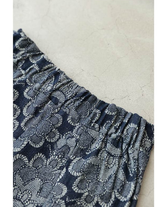 エキゾチックな花柄のデニム調ロングスカート