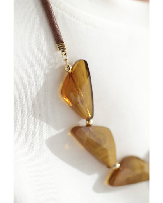 さんかくのクリアパーツ連なるネックレス