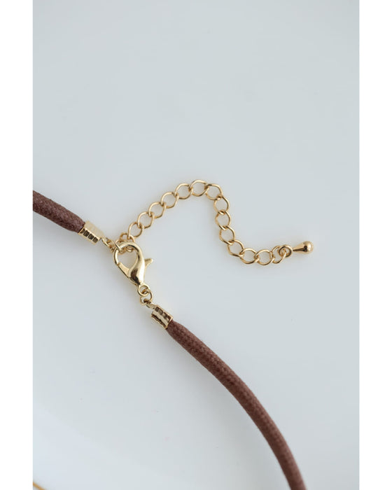 さんかくのクリアパーツ連なるネックレス