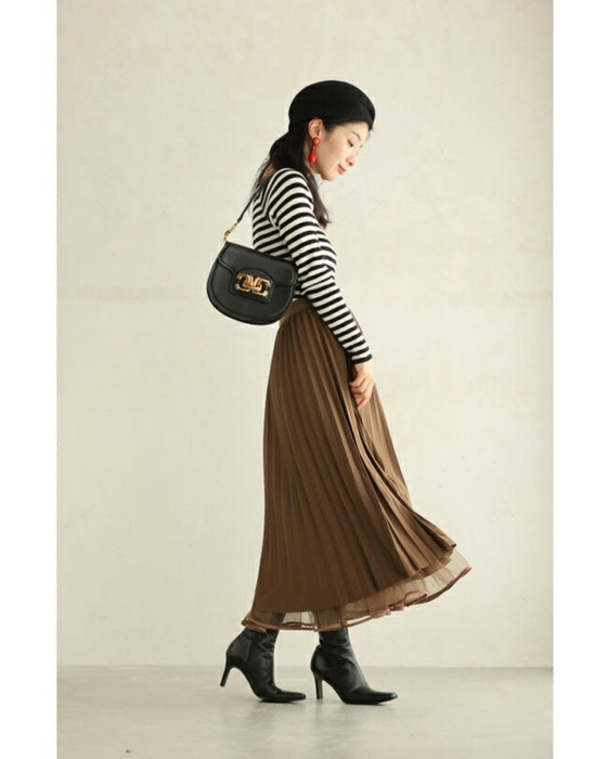 A reversible 2-way midi skirt with soft tulle and structured pleats