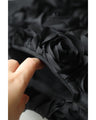 A voluminous bouquet skirt wrapped in rose flowers