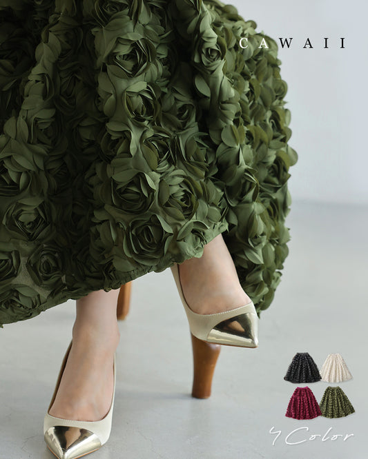 A voluminous bouquet skirt wrapped in rose flowers