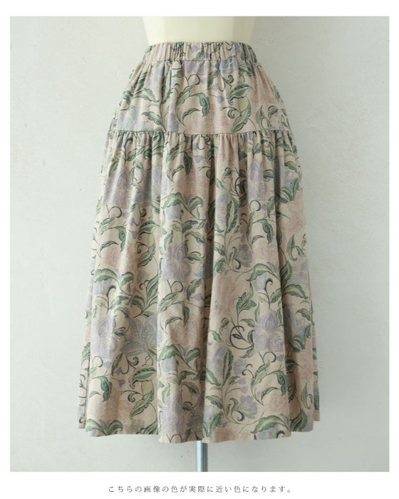 舞うような淡色花の切り替えミディアムスカート
