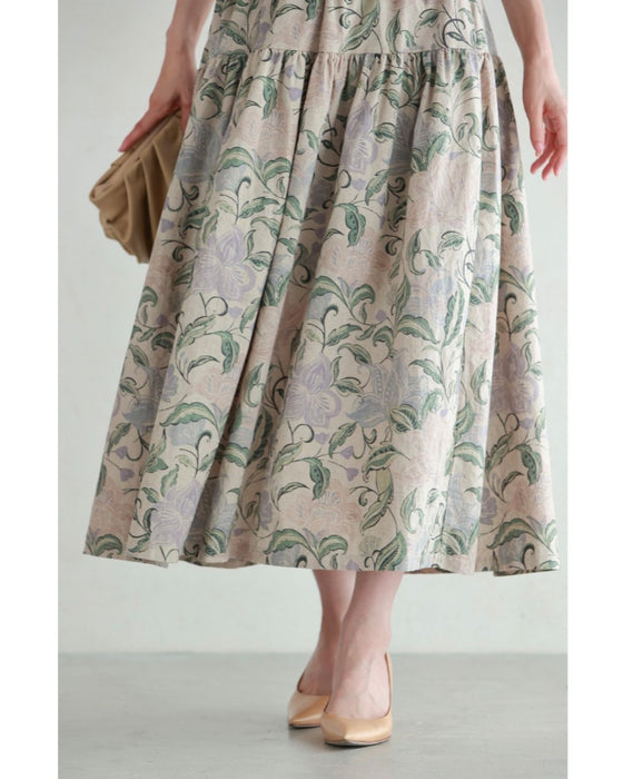 舞うような淡色花の切り替えミディアムスカート