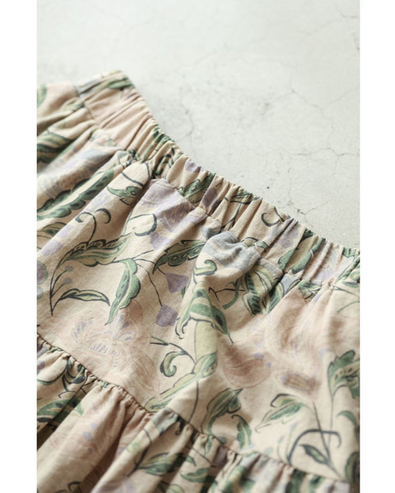 舞うような淡色花の切り替えミディアムスカート