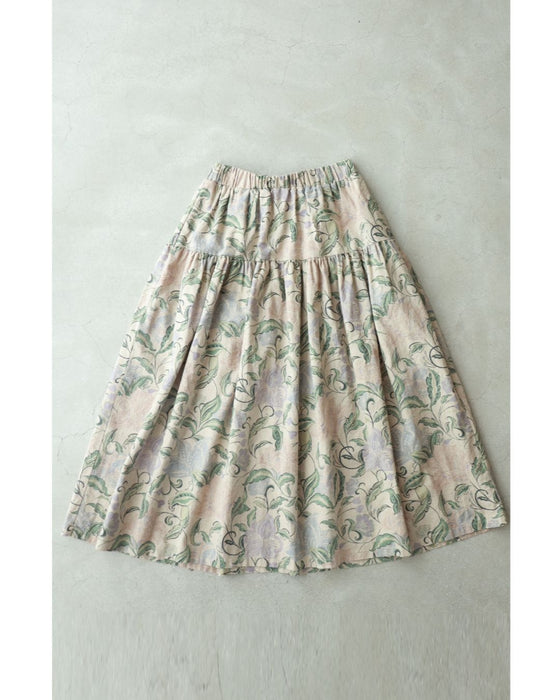 舞うような淡色花の切り替えミディアムスカート