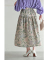舞うような淡色花の切り替えミディアムスカート