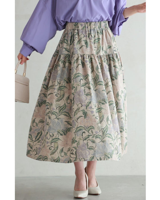 舞うような淡色花の切り替えミディアムスカート