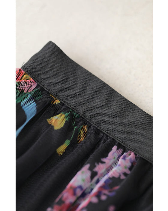 色とりどりの花が咲くふわふわフリルミディアムスカート