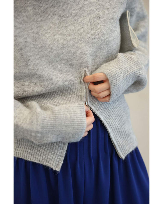 変化を楽しむハーフジップウエストのニットプルオーバートップス