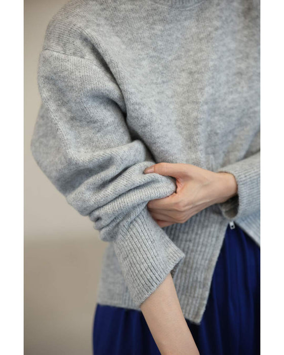 変化を楽しむハーフジップウエストのニットプルオーバートップス