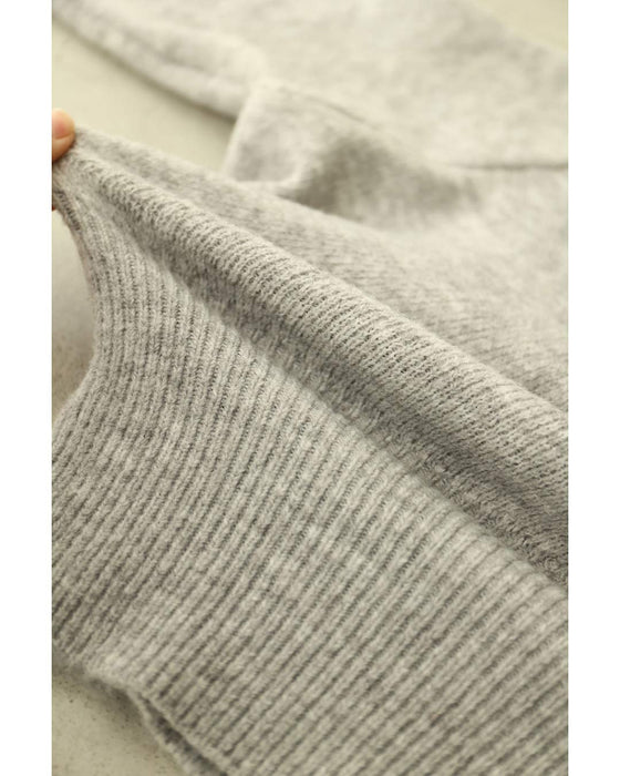 変化を楽しむハーフジップウエストのニットプルオーバートップス