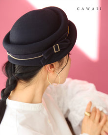  Add a touch of elegance to your outfit with a classic hat