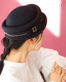 Add a touch of elegance to your outfit with a classic hat