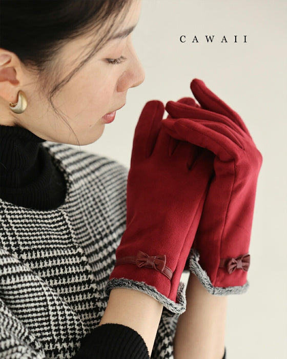 裏側起毛であったか。冬を彩る赤のプチリボン手袋