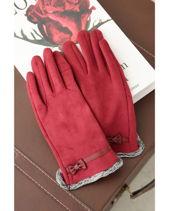 裏側起毛であったか。冬を彩る赤のプチリボン手袋