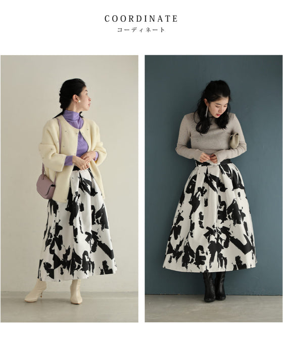 モードなペイントアートのタックミディアムスカート