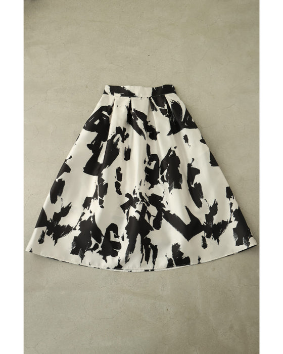 モードなペイントアートのタックミディアムスカート