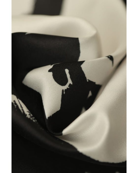 モードなペイントアートのタックミディアムスカート