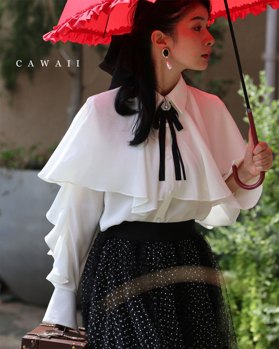 流れるようなフレアのクラシカルブラウストップス(ブローチ付き)